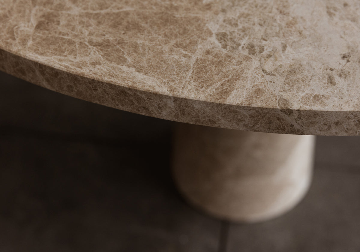 Close-up of a stone pedestal with a textured surface